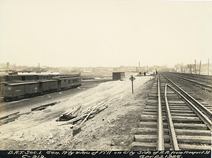 General northerly view of fill on westerly side of railroad from Freeport Street