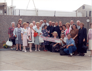 Welcome group at Boston Logan Airport for visiting priest (1)