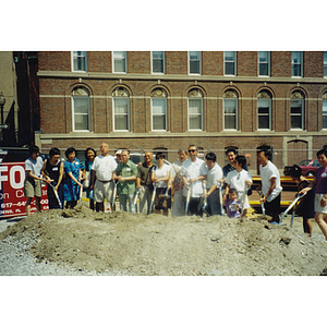 Residents of Chinatown and board members of the Boston Chinatown Neighborhood Center with shovels at the groundbreaking ceremony of Parcel C in Chinatown