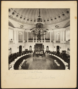 Portrait of Senate President John E. Powers standing at the Speaker's Chair in the Massachusetts State Senate Chamber