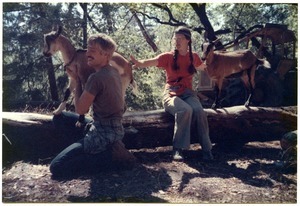 Sandi Sommer and her brother Wayne on a hike with goats