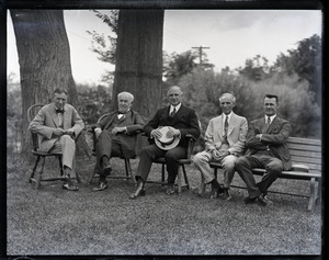 Harvey Firestone, Thomas A. Edison, Alvan T. Fuller, Henry Ford and Alton Blackington(?), seated outside (l. to r.)