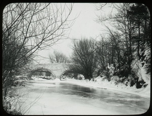 Hummelstown, Pennsylvania (double arched stone bridge over a river in snow)