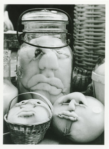 Grotesque figure in jar