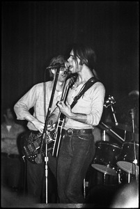 Grateful Dead performing at the Music Hall: Bob Weir singing with Phil Lesh in background