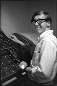 At the Boston University News Office: man with printing machine