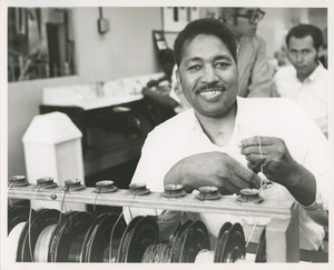 A man cutting wires at TOWER electronics training