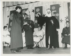 Clients performing in holiday play