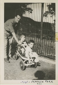 David Kahn with sons Joel and Paul in a wagon at Franklin Park Zoo
