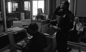 Unidentified officers in Boston Police Dispatch Operations Center