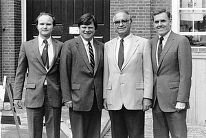 Press Secretary Frank Costello, Real Property Commissioner Edward J. Roche, Representative John Joseph "Joe" Moakley, and Mayor Raymond L. Flynn