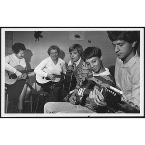 Group of people playing guitars