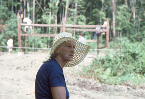 Mabel Cummings wearing straw hat at Moon Barn Raising at entrance to Hopkins Forest on 2 August 1975.