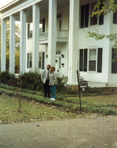 Wil Colom and Charleana Hill Cobb, outside Colom's house