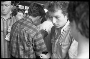 Bob Dylan, surrounded by the crowd, Newport Folk Festival
