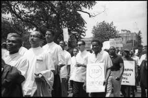 Protesters at a civil rights and fair housing demonstration: 'Stop Jim Crow'
