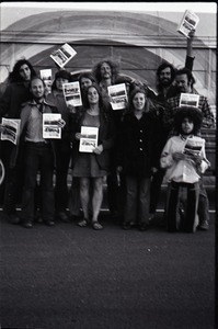 Free Spirit Press crew holding issues of the magazine