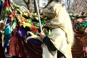 Marcher wearing a gilt-headed horse outfit: rally and march against the Iraq War