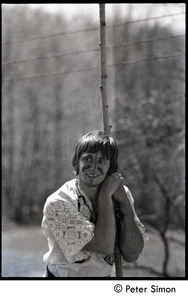 May Day at Packer Corners commune: Fritz Hewitt with painted face, leaning on a staff