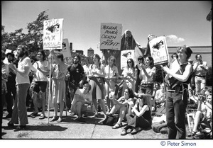 Protesters at a Mobilization for Survival antinuclear demonstration near Draper Laboratory, MIT, carrying signs opposing the MX missile and nuclear power