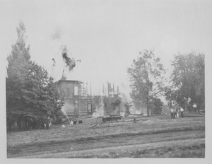 Chemistry Building (also known as College Hall) in flames, Massachusetts Agricultural College