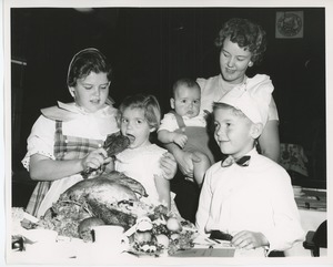 Young client and family with turkey