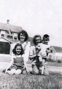 Cousins on the front lawn at the Aunts' house