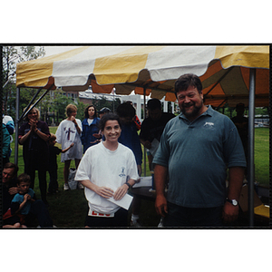 A woman and a man pose for a shot during the Battle of Bunker Hill Road Race