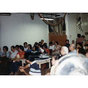 Audience seated for a performance at the Chinese Progressive Association's Fourth Anniversary Celebration