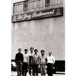 Six construction workers standing in front of Lei Jing Restaurant