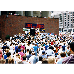 NYNEX striking employees and supporters listening to a speaker at a rally at City Hall Plaza, Boston