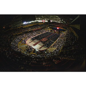 Aerial view of guests and graduates seated at commencement