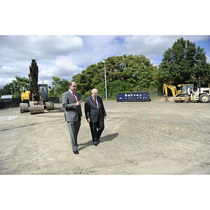 President Joseph E. Aoun and George J. Kostas walk on the site for the George J. Kostas Research Institute for Homeland Security