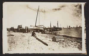 Two men sitting on the shoreline of Vineyard Haven, Martha's Vineyard, Mass., Mar. 17,1893