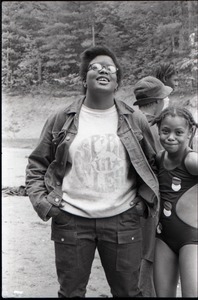 African American woman (possibly at a summer camp) wearing a Spirit in Flesh t-shirt