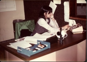 Unidentified woman answering the phone