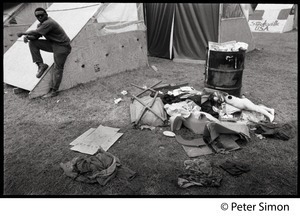 Man sitting on a plywood 'tent,' Resurrection City encampment