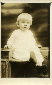 Stanley J. Lesinski: full-length studio portrait of seated infant