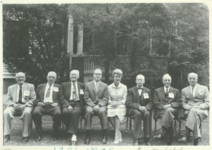 Members of the class of 1901 sitting outdoors with John and Angie Lederle at 60th reunion