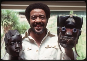 Bill Withers: Withers posing with an African bust and mask