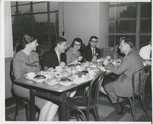 Attendees sitting down to a meal at a joint meeting of the American society of tool engineers and ICD