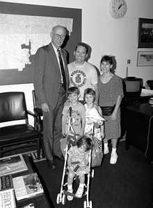 Congressman John W. Olver (right) with visitors to his congressional office (sleeping child in a stroller)