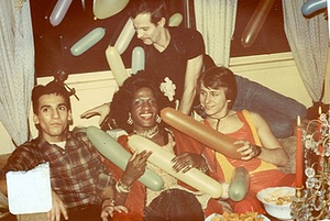 Photographs Featuring Marsha P. Johnson Sitting on a Couch with Friends, Playing with Balloons