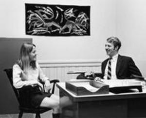 A female student meets with a professor or administrator, 1969