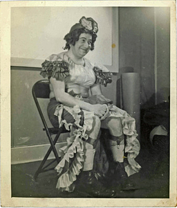 A Seated Performer Poses for a Photograph