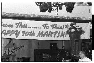 Martin Meehan, well-known IRA activist and Sinn Fein politician, celebrating his 60th birthday in the Star Club, Ardoyne, Belfast. His friends erected a banner which said, "Happy 70th Martin." He died on 2007 November 6