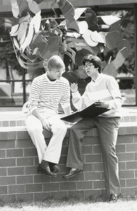 Students engaged in conversation at Outside Robsham Theater at Boston College