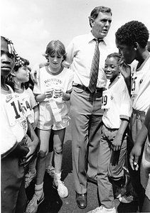 Mayor Raymond L. Flynn with unidentified children at Boston Marathon