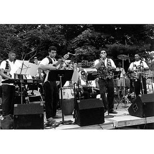 Band performing on the outdoor stage at Festival Betances.