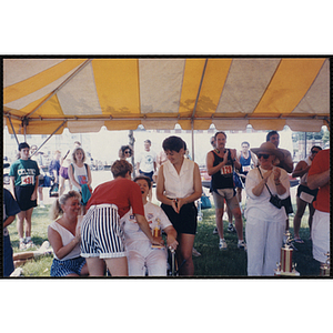 A woman receives a trophy during the Bunker Hill Road Race